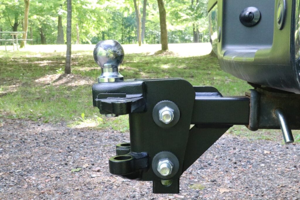 Adjustable trailer hitch receiver and tow ball setup for safe RV towing and proper towing capacity matching in the RV Towing 101 guide.